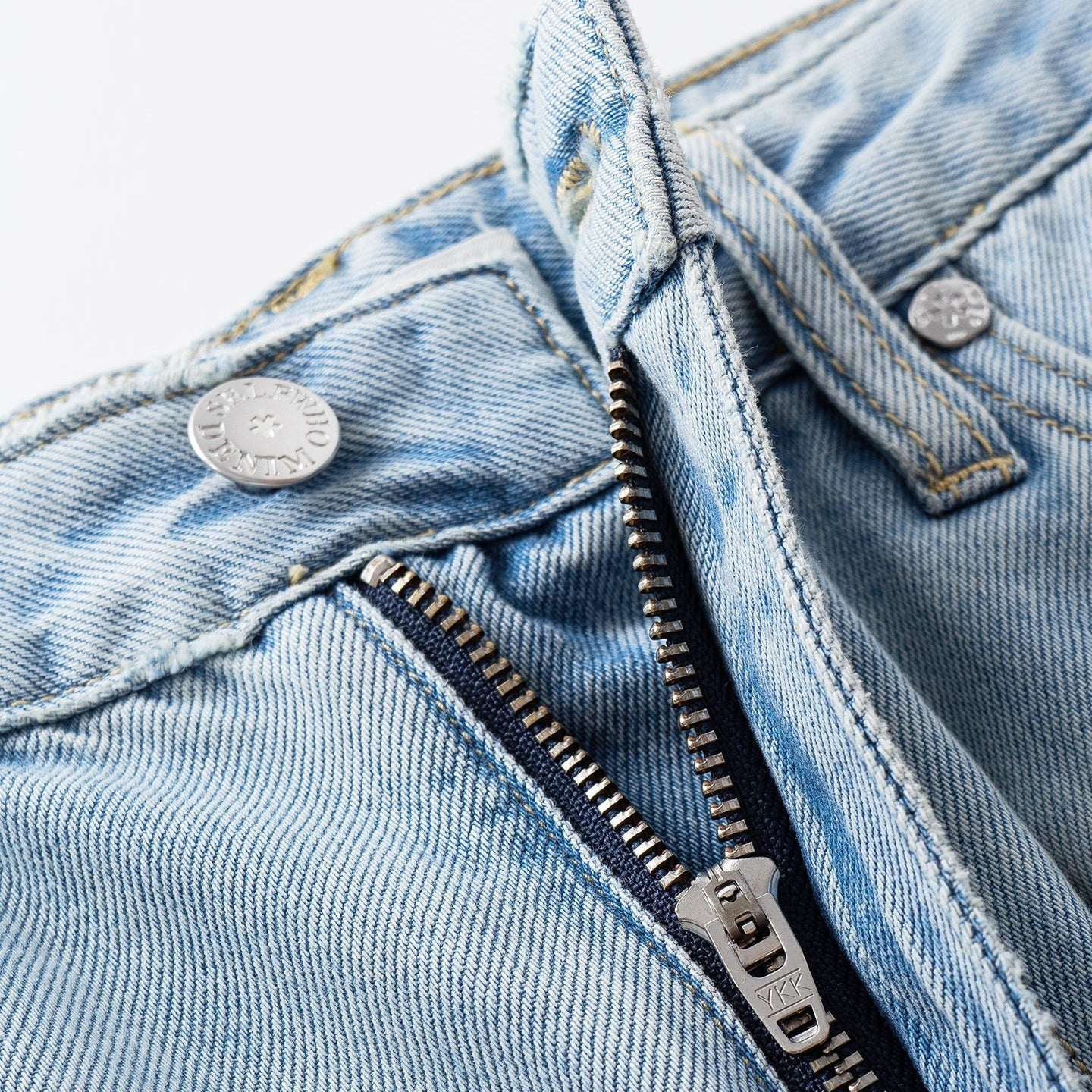 Light Wash Wide Leg Jeans With A Fluid Drape
