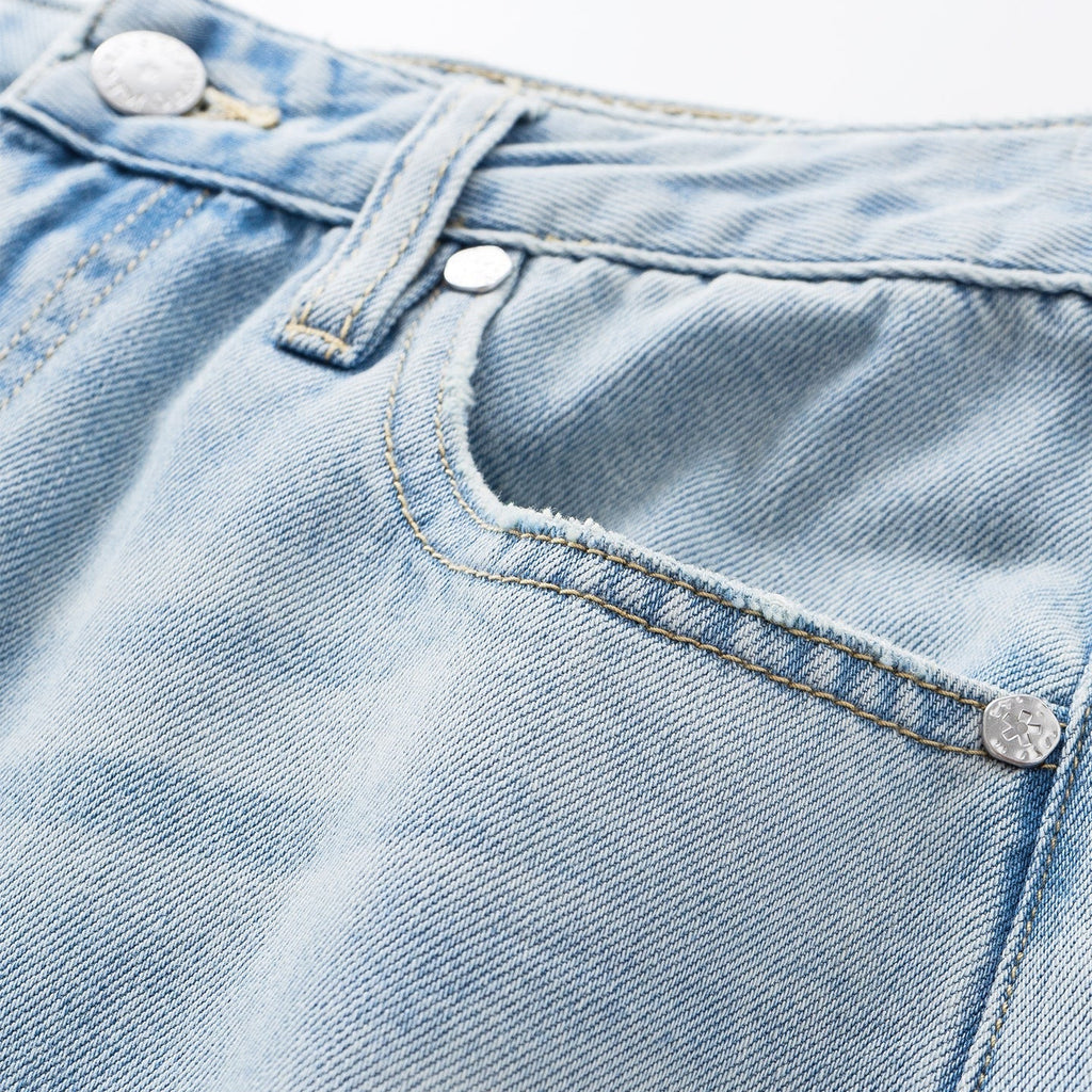 Light Wash Wide Leg Jeans With A Fluid Drape