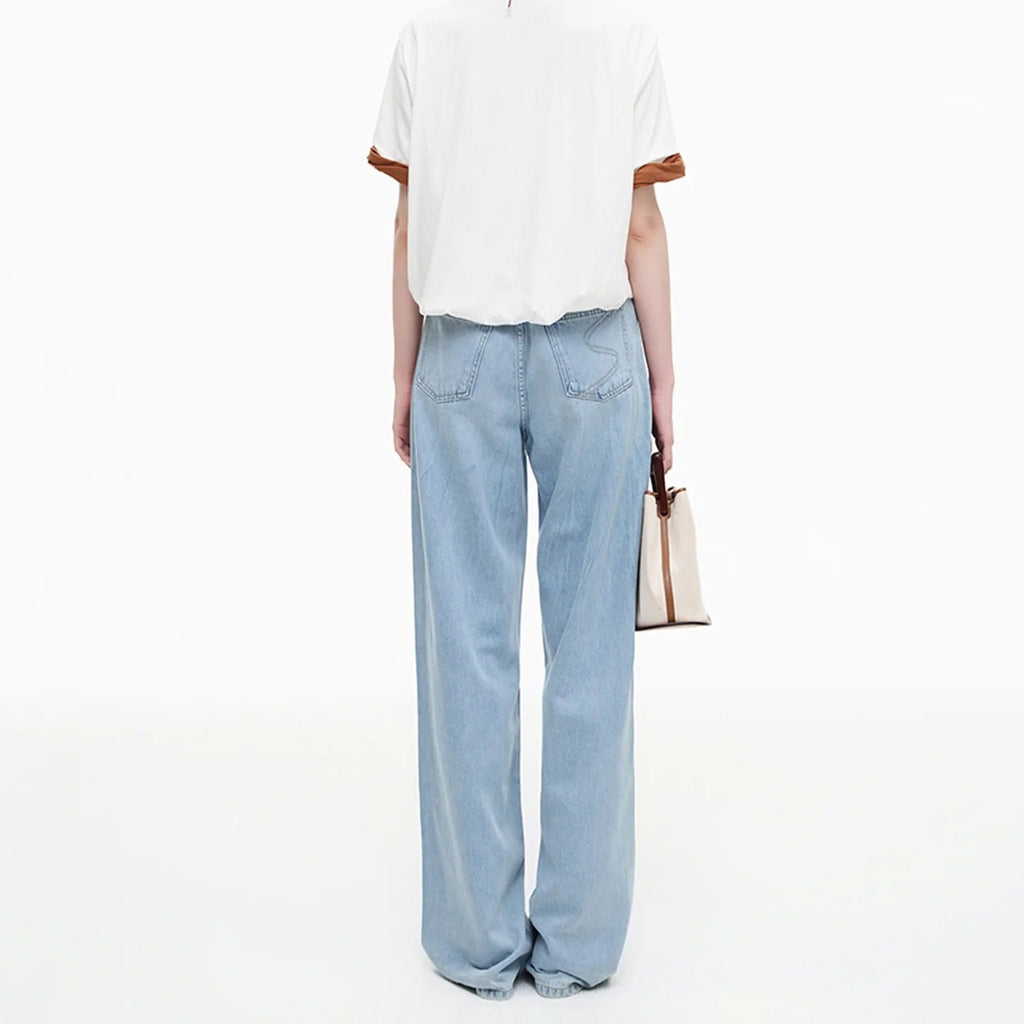 Light Wash Wide Leg Jeans With A Fluid Drape